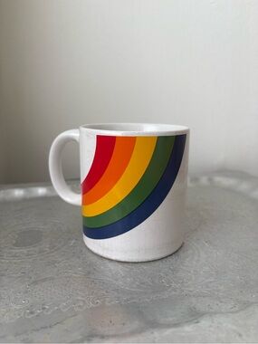 White Ceramic Mug with Rainbow Arc Design